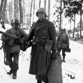 101st Engineers Emerge From Woods Following German Counterattack near Wiltz