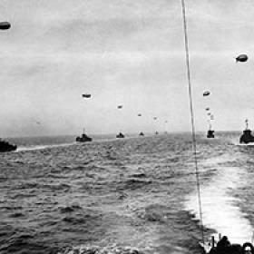 Flotilla of LCIs Make Their Way toward Normandy with Barrage Balloons Overhead