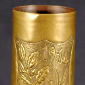 German 77 MM Artillery Shell with Branches, Berries, and Acorns