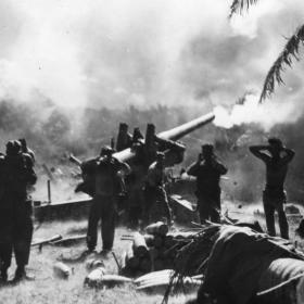 American Forces Fire Artillery at Japanese Defenses