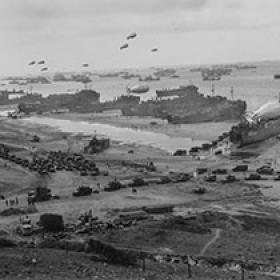 Supplies Brought Ashore — Landing Craft Crowd the Beach