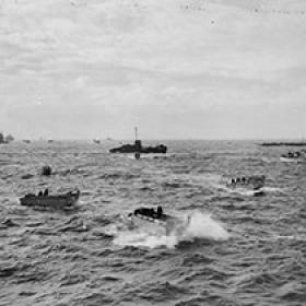 Allied Landing Craft and Other Naval Vessels Make Their Way toward the Beach