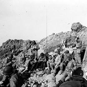 Army Rangers Rest atop Pointe du Hoc after Securing the Cliff