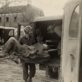 American Medical Personnel Evacuate Survivors for Medical Treatment at the Dora-Mittelbau Concentration Camp