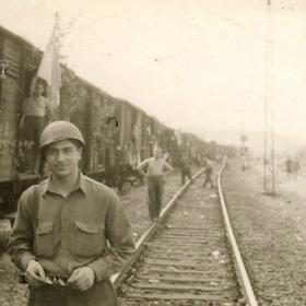 American Soldier next to of Trainload of Buchenwald Survivors Headed for Displaced Persons Camp