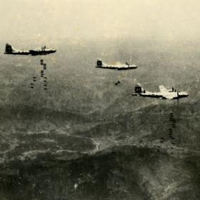 B-29 Bomber Releasing Incendiary Bombs Over Japan