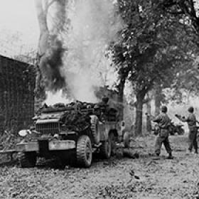 Soldiers Put Out a Burning Truck Fire
