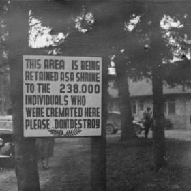 A Memorial Sign in Front of the Crematorium in Dachau Concentration Camp