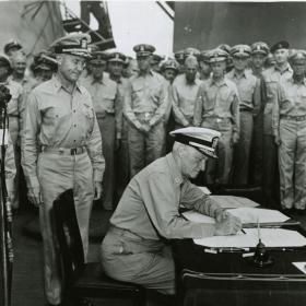Admiral Nimitz Signs the Surrender Aboard USS Missouri