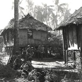 Soldiers Rest After Making Their Way Inland